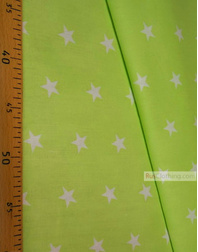 Textile enfant au metre ''White Star On Light Green''}