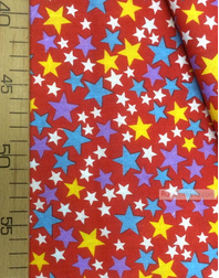 Tissu enfant au metre ''Colored Stars On Red ''}
