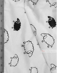 Textile enfant au metre ''Black Sheep On A White Field''}