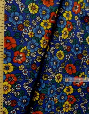 Tissu coton fleuri au metre ''Wildflowers On A Blue Field''}