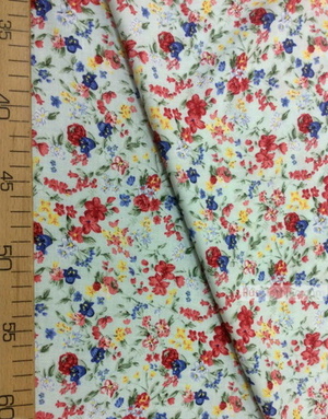 Viscose rayon by the yard ''Red And Blue Flowers On Mint Field''}