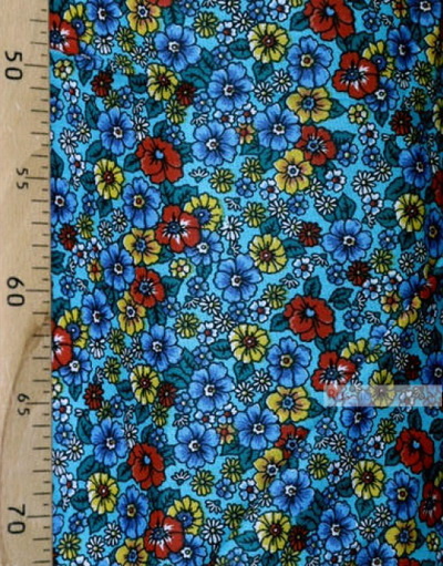Tissu coton fleuri au metre ''Wild Flowers On A Turquoise Field''}